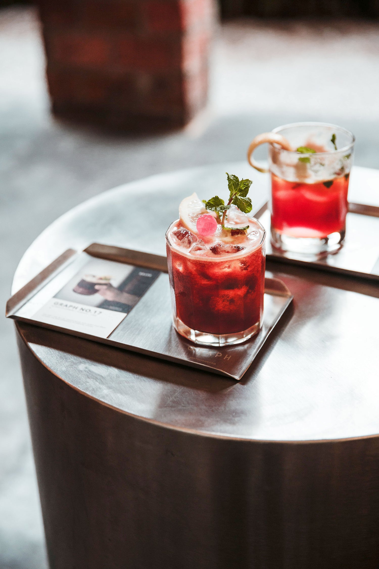 two-red-kombucha-cocktails-on-a-tray